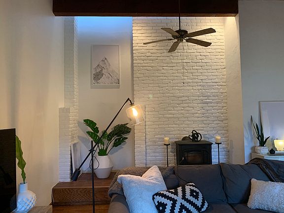 Den with refreshed brick