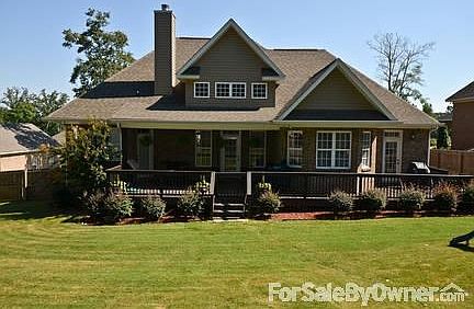 Welcoming entry! : Beautiful front door and arched windows. Brick extior with stone accents.