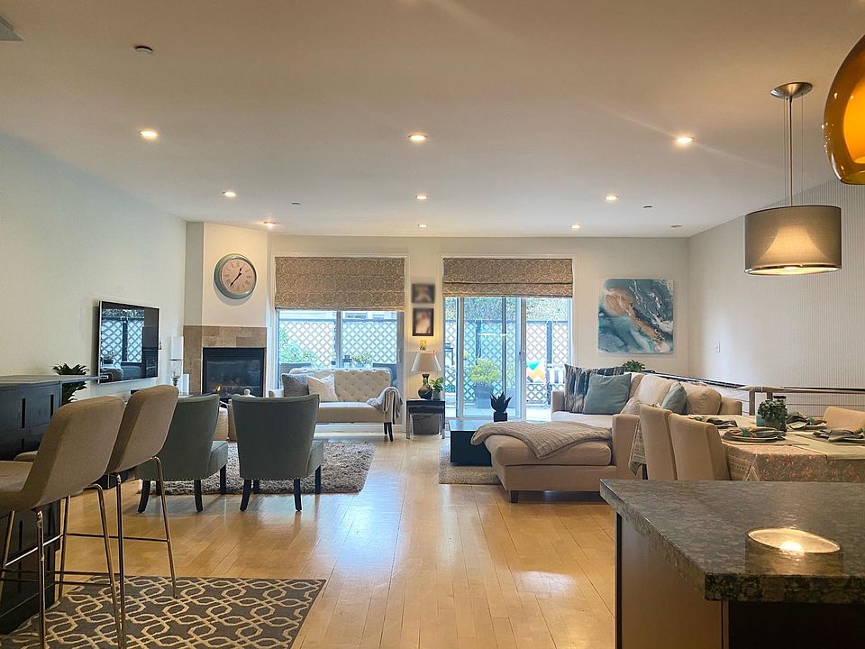 Living Room with sunny patio/deck