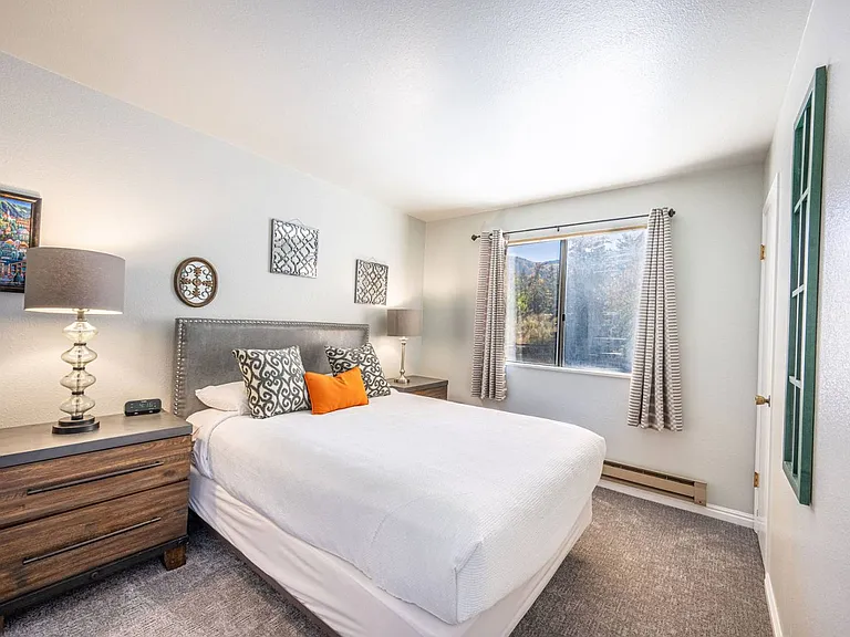 Master bedroom with a gorgeous mountain view!