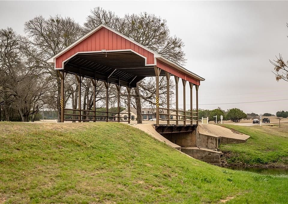 Beautiful wooden bridge that you will cross to get to your property.