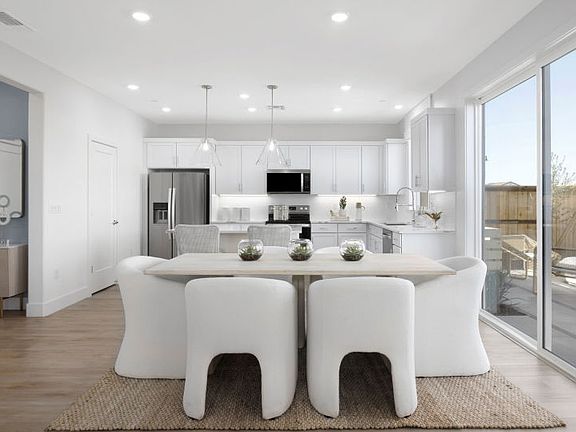 Beautiful cafe nook with sliding glass doors to the patio