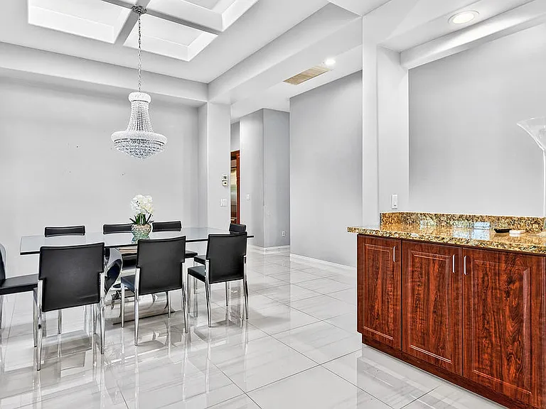 FORMAL DINING AREA BETWEEN GREAT ROOM & MEDIA ROOM