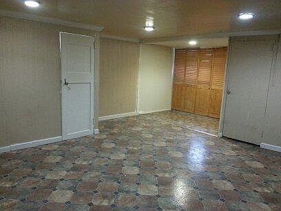 Living/Bedroom Area with Walk in Closet View