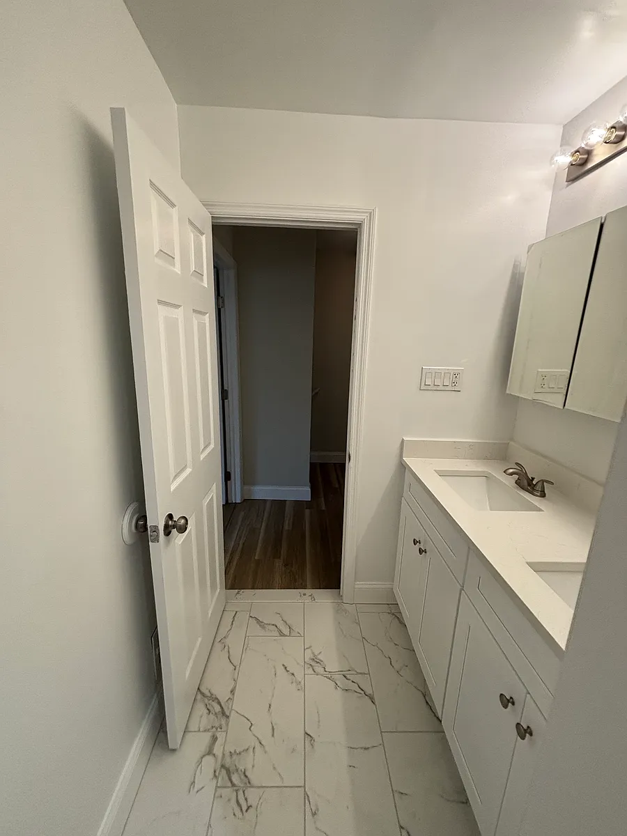 Upstairs Bathroom with Double Sinks and Double Medicine Cabinets - 21 Eaves Mill Rd #21