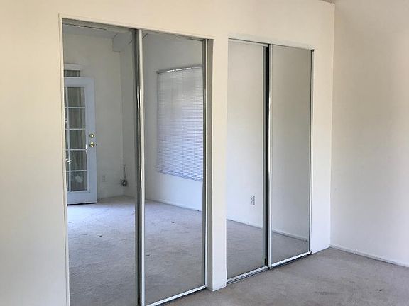 Bed room closet with mirror