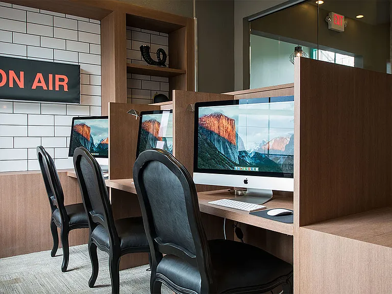 Apartment community business center with MAC work stations at Griffis Lakeline Station in Austin, Texas .