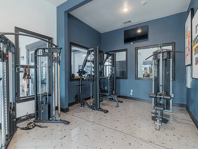 Our fitness center is equipped with a variety of machines: elliptical, treadmill, stairstepper, squat machine, cable and resistance machines, yoga balls, bike, and free weights