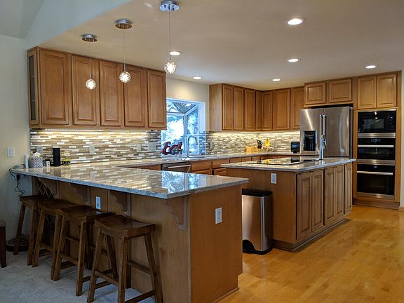 Remodeled chef's kitchen with top-end appliances and walk-in pantry (pantry not shown) is an entertainer's dream!