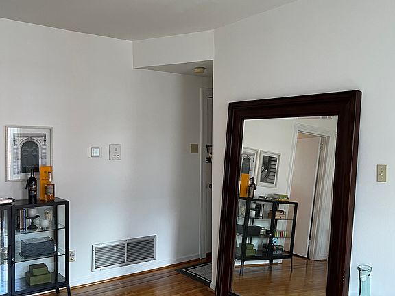 Living room - opposite view; intercom on wall