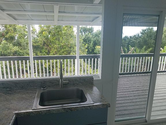 View of macadamia farm with far ocean view