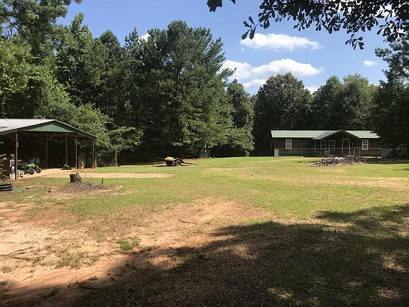 There is plenty of room around the cabin and shed.