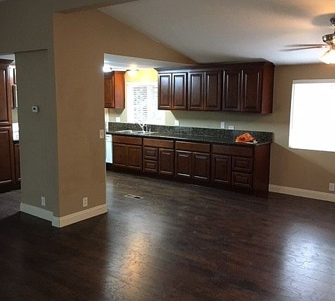 Open concept living, dining and kitchen