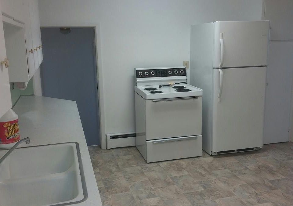 kitchen and door to 2 bedrooms