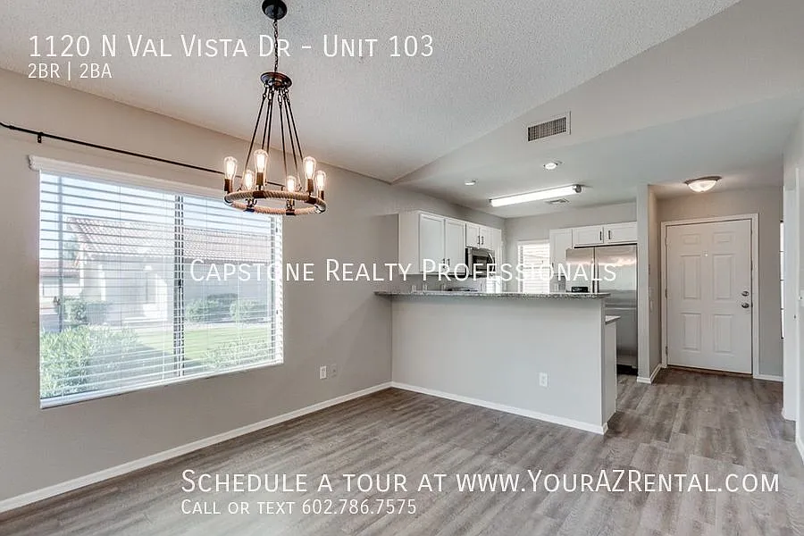 Building Photo - 1120 N Val Vista Dr #103