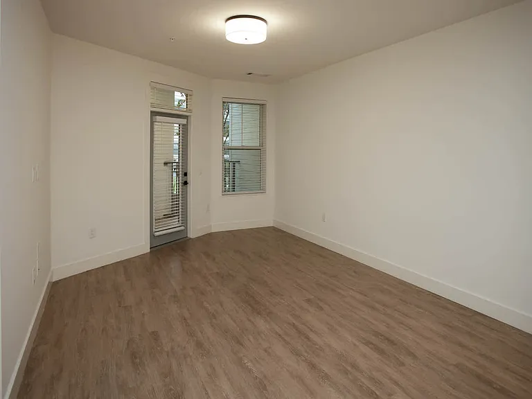 Living Room with Balcony and Hard Surface Flooring
