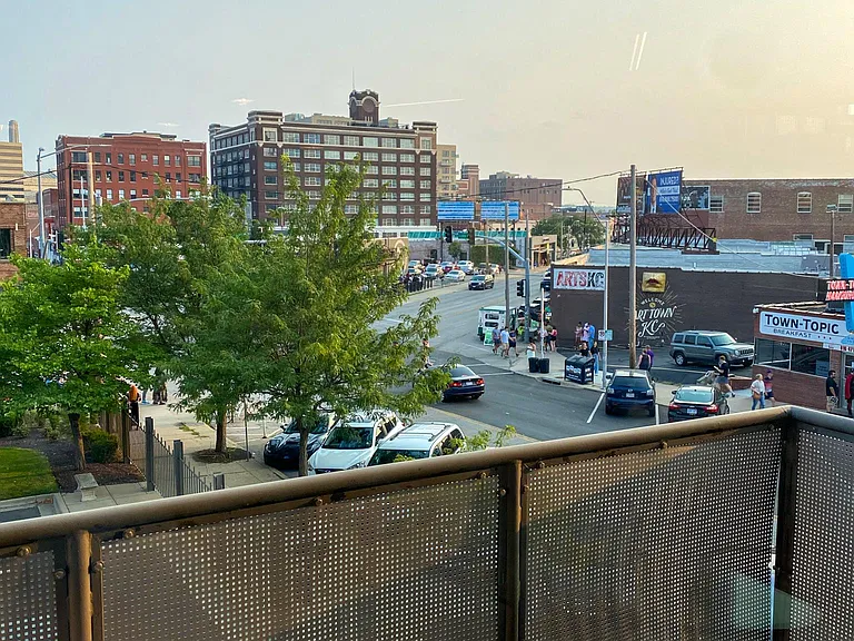 South facing balcony in the heart of the Crossroads.