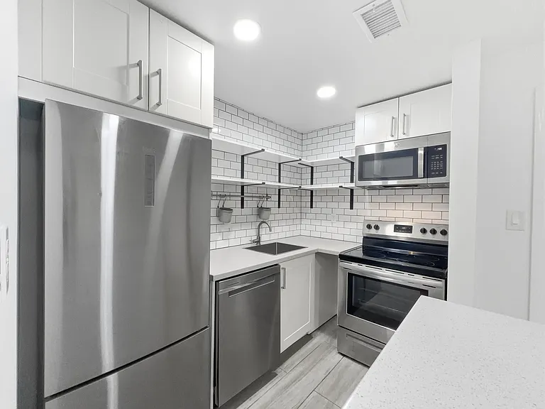 Kitchen with stainless steel appliances