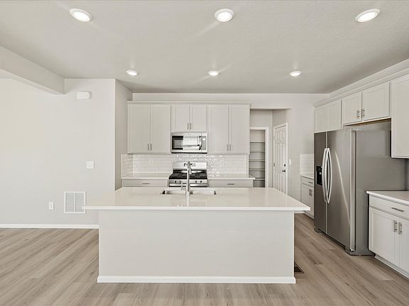 The Maroon Bell floorplan interior image taken at a Meritage Homes community in Greeley, CO