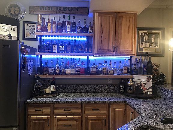 Hickory cabinets and shelvin