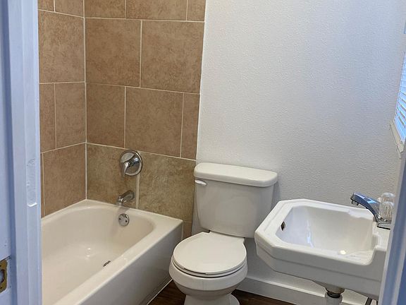Bathroom Area: new flooring and tub