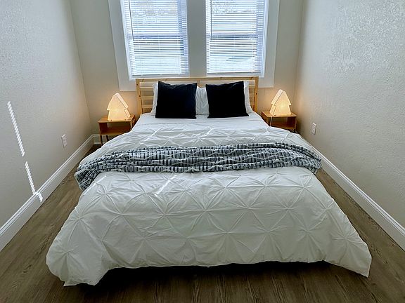 Private bedroom with queen bed and closet/dresser for clothing
