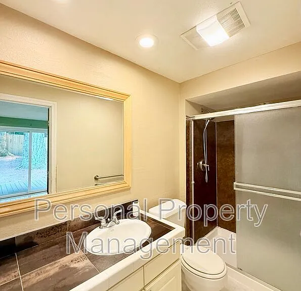 9411 NE Pinecreek St — Photo 18