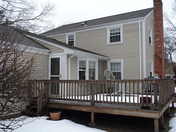 Back of the home with deck 