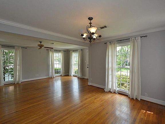 Awsome floor to ceiling windows in Living Room and Dining Room.