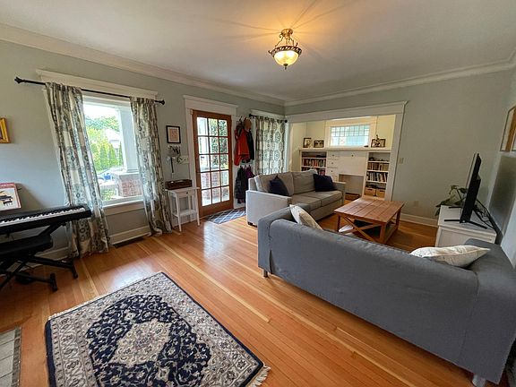 Windows on all sides bring sunlight into this charming craftsman home!