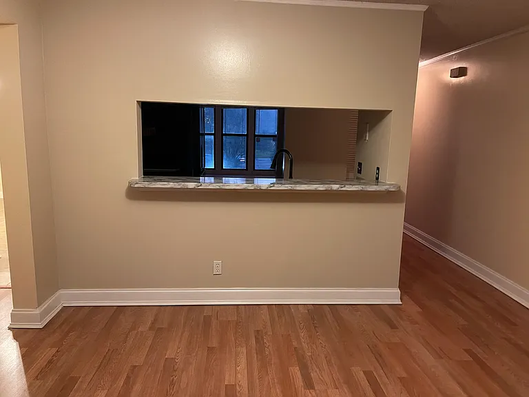Dinining area overlooking bar to kitchen