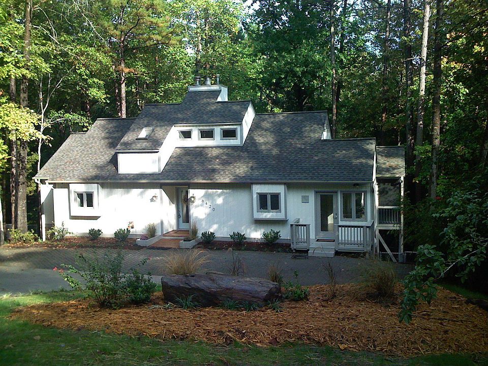 The quiet retreat, surrounded by a few trees.