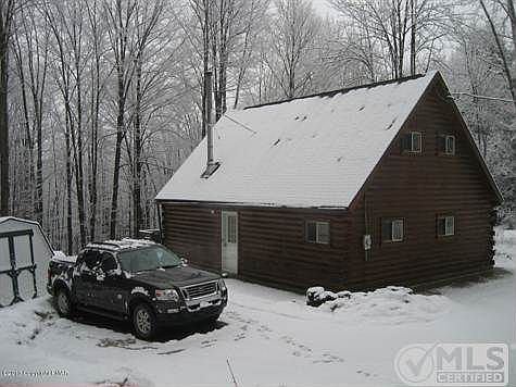 Winter Pic Pine Log Sided Chalet