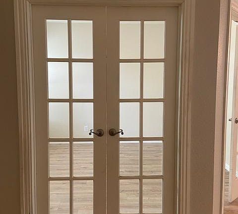 French doors extra room can be used as an office or extra bedroom
