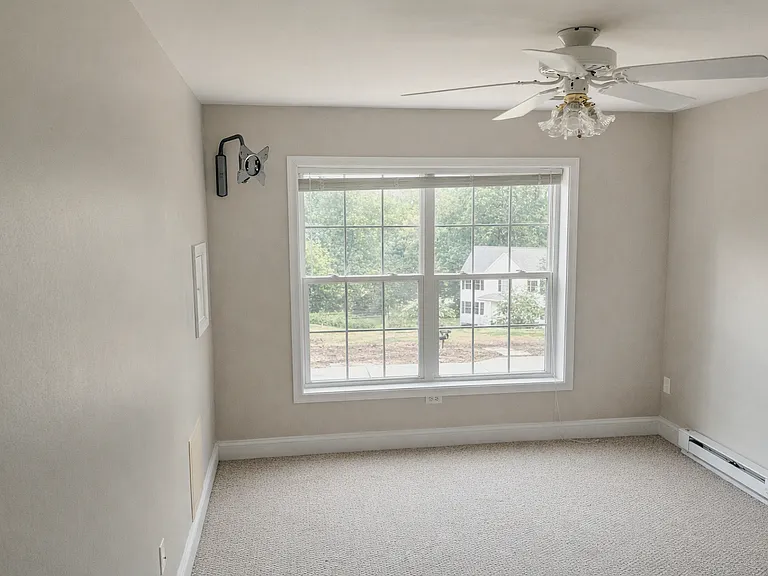 Flexible second bedroom ideal for office, guest room, or additional living space