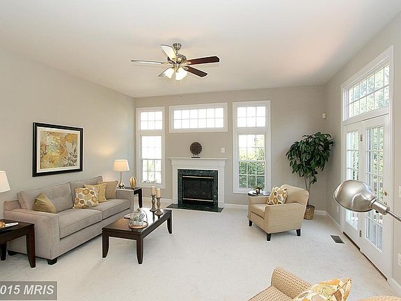 Family Room with gas FP and doors to deck