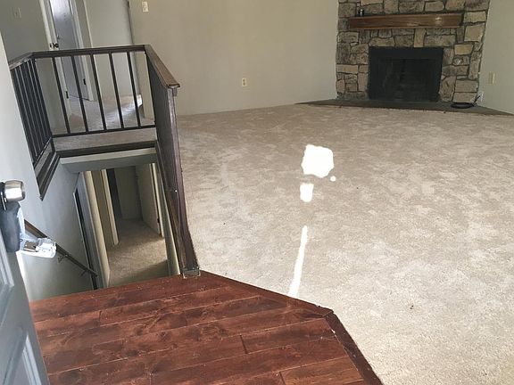 The living area as you walk in to the unit.