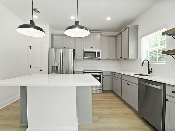 Kitchen with stainless-steel appliances