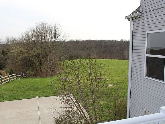 View of side yard from deck