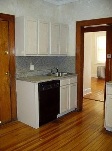 Kitchen & left rear BR