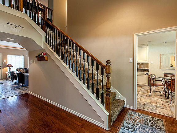 TWO STORY ENTRY WITH TRUE CUSTOM FEATURES ~