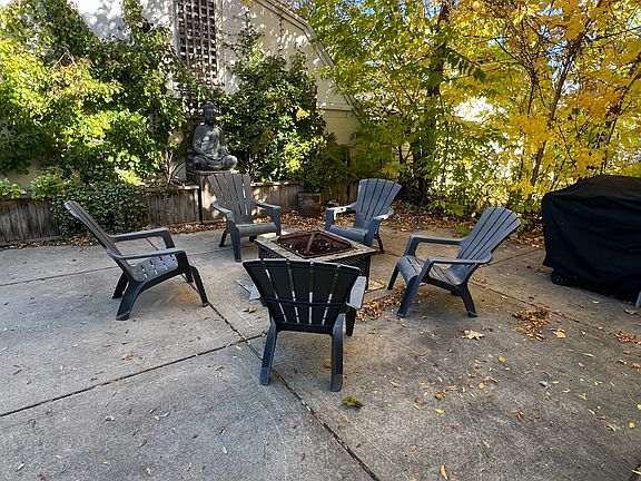 Backyard patio with fire pit.