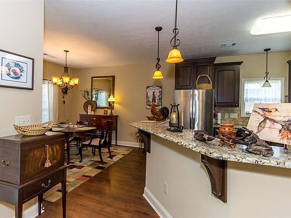 Looking from Living Room to Dining Room and Kitchen
