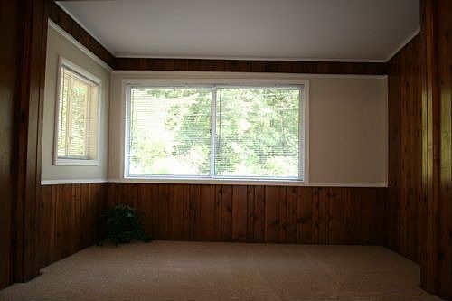 This bedroom has ample natural sunlight