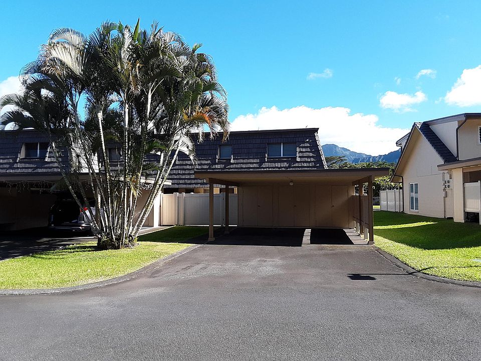 Carport that accomodates 4 vehicles