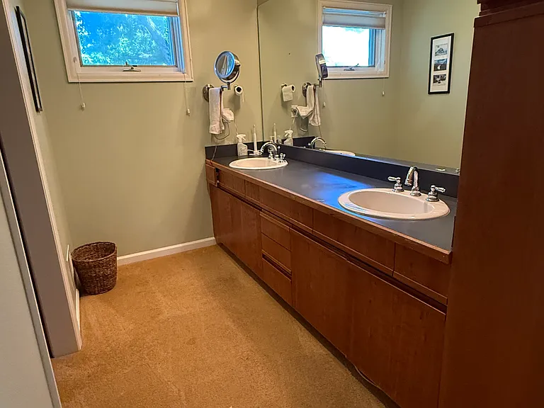 Upstairs master bath sinks & walk in closet to left not pictured.