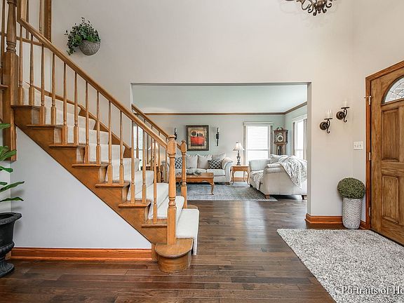 2 story foyer with coat closet.