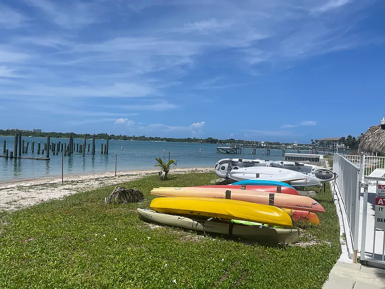 East view of Kayak storage, pool railing, new dock piling installed and Ocean inlet jettys in the distance...07-19-26
