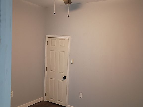 Bedroom to the right of bathroom