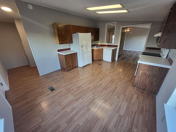 Room for a dining table. Laundry hookups to the left.